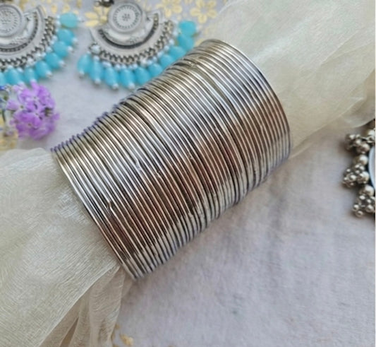 Silver bangels 3 dozens